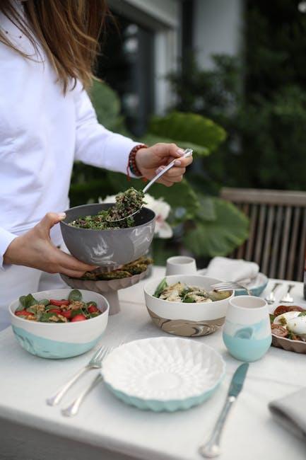 A woman is preparing food on a table